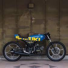 The bike has a 130cc engine and a 4.3litre fuel tank. Small But Mighty A Suzuki A100 Built By Malaysia S Fngworks Dig It Croig Caferacersofinstagram Ca Suzuki A100 Cafe Racer Motorcycle Cafe Racer Bikes