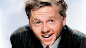 Mickey Rooney with a Studebaker Land Cruiser, 1935-