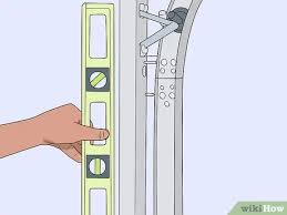 Garage door alignment do it yourself. 3 Ways To Adjust Garage Door Tracks Wikihow