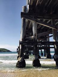 A utopia of things to see and do, the coffs coast has great attractions including the iconic big banana, uncrowded beaches, ancient rainforests, marine park, tasty cafes, whale watching and bushwalking. Hd Wallpaper Australia Coffs Harbour Beach Sand Water Wooden Blue Wallpaper Flare