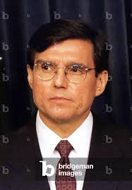 Image of Federico Pena at a White House news conference December 20