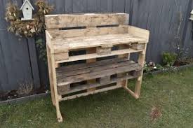 We normally do it kneeling on the lawn so as not to make a mess on the picnic table. Upcycled Pallet Diy Potting Table Hollie Berries