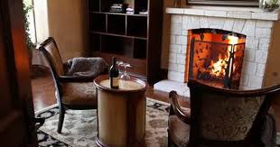 Stock Video Footage Cozy Chairs In Front Of Fireplace With Bottle Of Wine 00 00 07 From 50 Royalty Free Download Now On Pond5 Fireplace Cozy Chair Chair