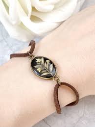 Maybe you would like to learn more about one of these? Real Plants Resin Bracelet Dried Flower Resin Bracelet Etsy In 2021 Resin Bracelet Flower Resin Jewelry Resin Jewelry Diy