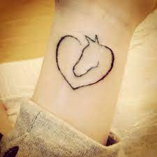 Jumping horse and horse shoe tattoo on back shoulder. 37 Best Horse Heart Tattoo Ideas Horse Heart Tattoo Horse Heart Heart Tattoo