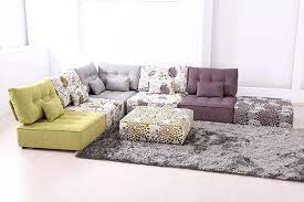 A comfortable room in a large house used for relaxing or for entertaining guests 2. Low Seating Living Room Furniture Ideas By Fama