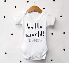 Personalised Baby Clothing Personalised Baby Vests Cows And Kisses New Baby Products Baby Vest Cool Baby Stuff