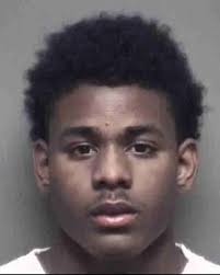 U.S Marshals arrest suspect after 22 year old man fatally shot in movie  theater parking lot