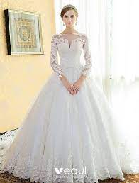 Lace and tulle long sleeve ball gown wedding dress. Glamorous Bridal Gown 2017 Square Neckline Applique Lace Wedding Dress With Long Sleeves