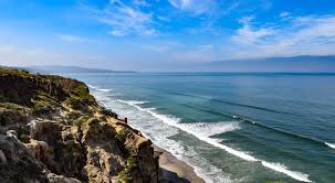 Credit Gloria V Moeller Shutterstocklocated Right Next To The Popular Pebble Beach Carmel By The Sea Is Much Less Crowd Beach Town Beach Whale Watching Tours