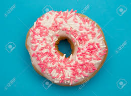 Maybe you would like to learn more about one of these? White And Pink Sprinkle Donuts On A Blue Background Stock Photo Picture And Royalty Free Image Image 104013500