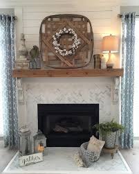 So, we decided to shiplap the fireplace and add a wood mantel. Renovate An Outdated Tile Fireplace To Shiplap And Herringbone Tile With A Wood Mant Farm House Living Room Farmhouse Fireplace Decor Farmhouse Fireplace Ideas