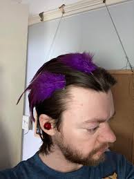 Thank you all for the advice the other day. Kylar now has more of a naga  look after sticking these feathers to hair extension clips with some thick  thread and superglue, while