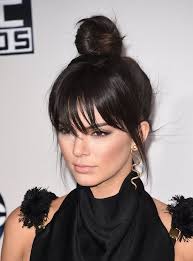 Wash your hair, dry it and curl it lightly just to get a few natural waves. How To Get Bangs Without Cutting Your Hair Brit Co