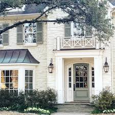 Beatutiful Cream Painted House With Grey Green Shutters Exterior House Colors House Exterior House Paint Exterior