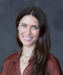 Shout out to WIDA's Emily Kurth! This month, we're highlighting Emily.  She's a professional learning curriculum specialist here at WIDA, and she's  a true workplace adventurer. Last year, she led a project