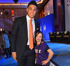 His dad is melvin booker 42, a former nba player who played basketball at the university of missouri. Devin Booker Forms Unlikely Bond With Phoenix Suns Fan Sports Illustrated
