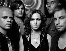 Black And White Music Video Female Singer 2000s The Cardigans Are A Swedish Rock Band Formed In Jonkoping Sweden In 1992 By Guitarist Peter Svensson Bassist Magn Early 2000s Music Music Bands 2000s Music