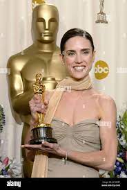 Actress Jennifer Connelly Holds Her Oscar After Winning Best Supporting Actress At The 74th Annual Academy Awards In Hollywood March 24 2002 Connelly Won The Academy Award For Her Role In The