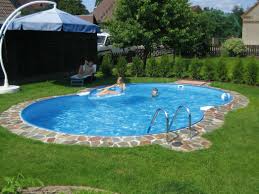 Grass Around Pool Small Backyard Landscaping Backyard Pool Backyard Garden Layout