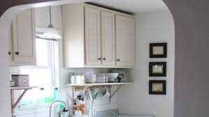 Typically, 18 between counter top and base of upper cabinets. How To Raise Upper Kitchen Cabinets To The Ceiling Youtube