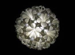 Lights Made From Plastic Bottles And Other Debris Plastic Bottle Art Bottle Lights Plastic Milk Bottles