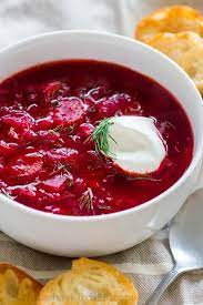Russian borscht with sorrel and fresh garlic knots pamopushkas. Classic Borscht Recipe Video