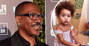 Eddie Murphy's Curly-Haired Granddaughter Evie Rocks a Floral Dress while  Proving She's Smart in Video