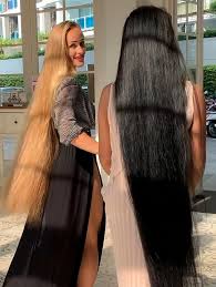 Slender, with platform shoes and long, feathered hair. Video Beautiful Hair In A Beautiful Place Realrapunzels