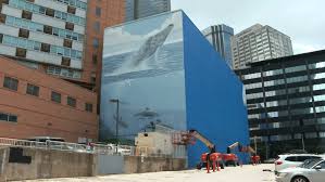 Artist sues for $25 million over destruction of Dallas whale mural