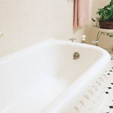 Cast iron tubs stain over time and look awful even after cleaning. How To Refinish A Cast Iron Tub This Old House