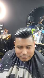 El Gilbert Barber