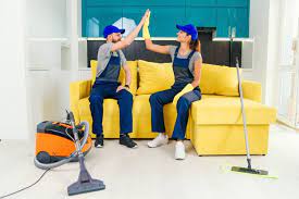 Satisfied Cleaners In Blue Uniforms Giving Each Other High Five And Continuing To Clean The Floor In Cleaning Service Flyer Logo Design Collection Clean Office