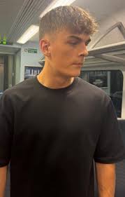 What is the identity of the unidentified 37 train passing through  Nottingham in August 1983?