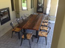 This Reclaimed Wood And Steel Outdoor Dining Table Was Custom Built To Reclaimed W Dining Table Set Designs Modern Dining Room Tables Wooden Dining Room Table