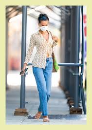 Who made bella hadid's red print handbag, black shoes, sunglasses, belt, jewelry, and print shirt? Bella Hadid Street Style 13 Style Lessons Teen Vogue
