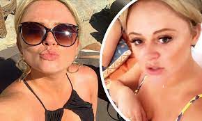 Emily Atack flaunts her buxom bust in an array of sexy swimsuits during  Mykonos trip 