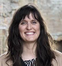 U Honors Graduate Coordinator Bryce Nelson with Online Excellence Staff  Award