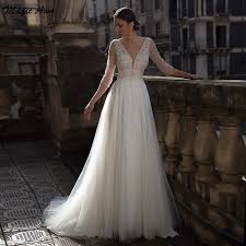 Wedding gowns that sparkle are perfect to wear around the holidays, a shimmering sparkle wedding gown would be a dreamy way to tie the knot in the festive season! Lace Appliques Ball Gown Wedding Dresses Illusion Vintage Cap Sleeves Long Tulle Arabic African Bridal Gowns Vestido De Novia Buy At The Price Of 78 00 In Aliexpress Com Imall Com