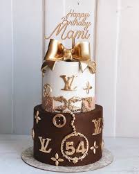 The cake is red velvet with white chocolate ganache. Louis Vuitton Two Tier Cake Beautifully Decorated Customized Cake Dubai