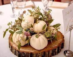 What A Great Centerpiece Idea For A Fall Wedding Or Celebration Wooden Slab With Mini Pumpkin Centerpieces Wedding Pumpkin Wedding Flower Centerpieces Wedding