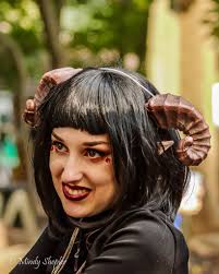Woman with huge white wings at Oregon Country Fair?