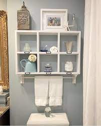 You can have them hanging or freestanding. Coastal Bathroom Styled Shelf With Towel Rack Towel Rod Towelrack Bathroom Bathro Floating Shelves Bathroom Cottage Bathroom Design Ideas Home Decor Near Me