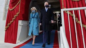 Jill biden's dress at president joe biden's inauguration ceremony reflected the united states of america in a surprising way. Inauguration Fashion Purple Pearls And Mittens Bbc News