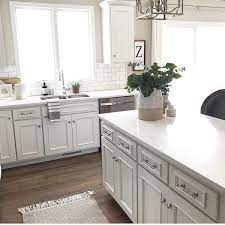 Pairing your gray kitchen cabinets with the right materials and within the right color scheme is important for the overall look of your kitchen. Repose Gray Sw 7015 Sherwin Williams Grey Kitchen Designs Grey Kitchen Colors Grey Kitchen Walls