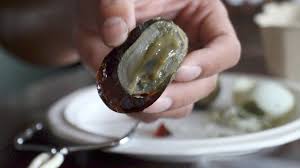 Traditionally century eggs were made by preserving chicken or duck eggs in a mixture of salt, lime and ash, then wrapping in rice husks for several weeks. 1000 Year Old Century Egg Food Review Youtube