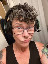 Roast me or whatever. I'm 52. Grey hair don't care. Happily married to a  man 9 years younger than me. No make up no filter. I don't need paying  cause I make