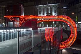 Flux Cocoon Made From 3 600 Red Led Lights Wraps Around A Bridge In Lausanne Switzerland Urban Lighting Residential Building Design Installation Art