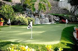 A more homey example of a home putting green, the cedar fences with climbing vines all over, the clean treatment of the. Putting Green Turf Rolls Quality Putting Green Turf