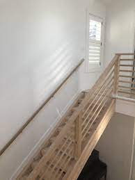 Horizontal Stair Railing On Glulam Staircase All Fir Slats Are 1x2 And Handrail Is 2x4 Super Easy I Staircase Railing Design Staircase Remodel House Stairs